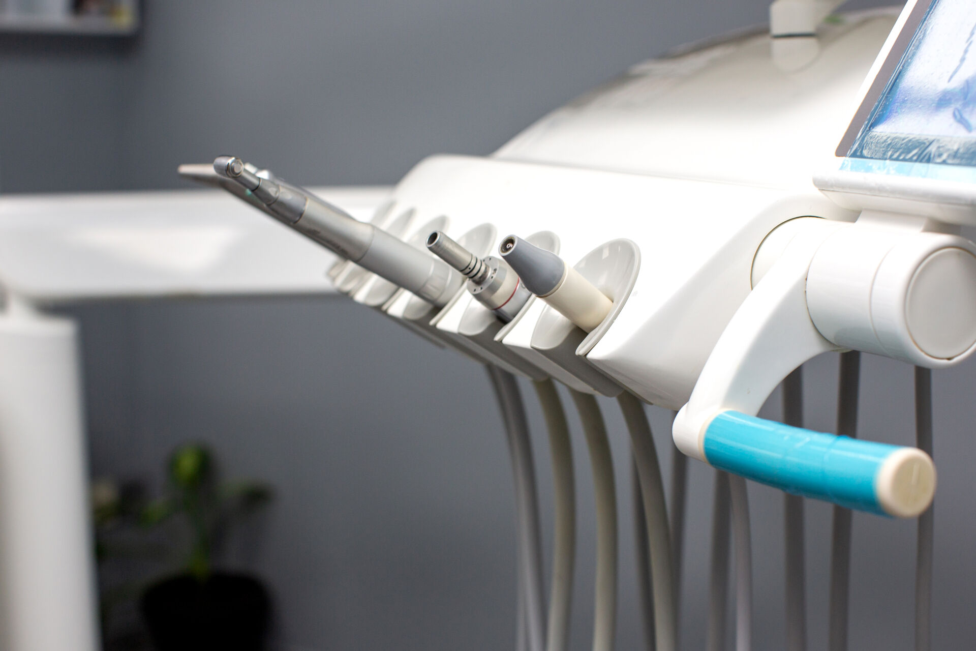Dental tools with pipes attached to tool station